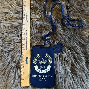 Adidas navy and gold crossbody pouch